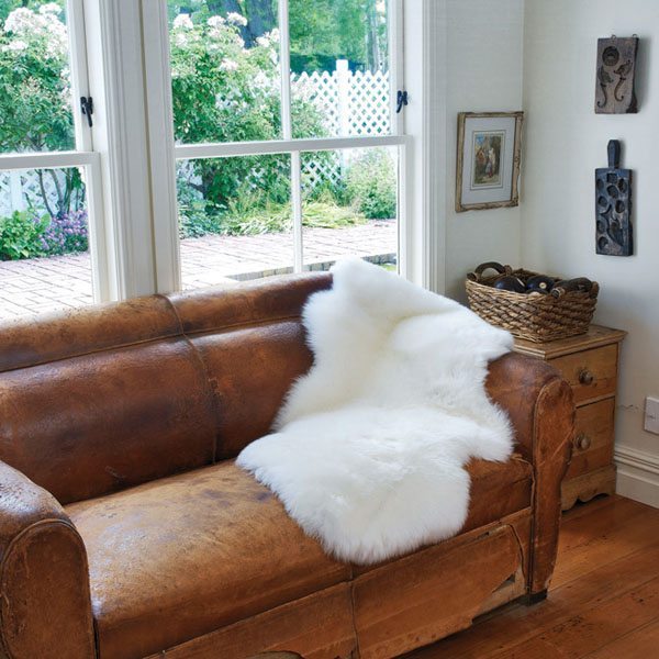 single white sheepskin on couch single white sheepskin on couch