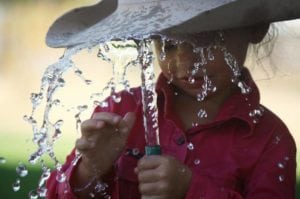 Akubra Hat On Girl With Water